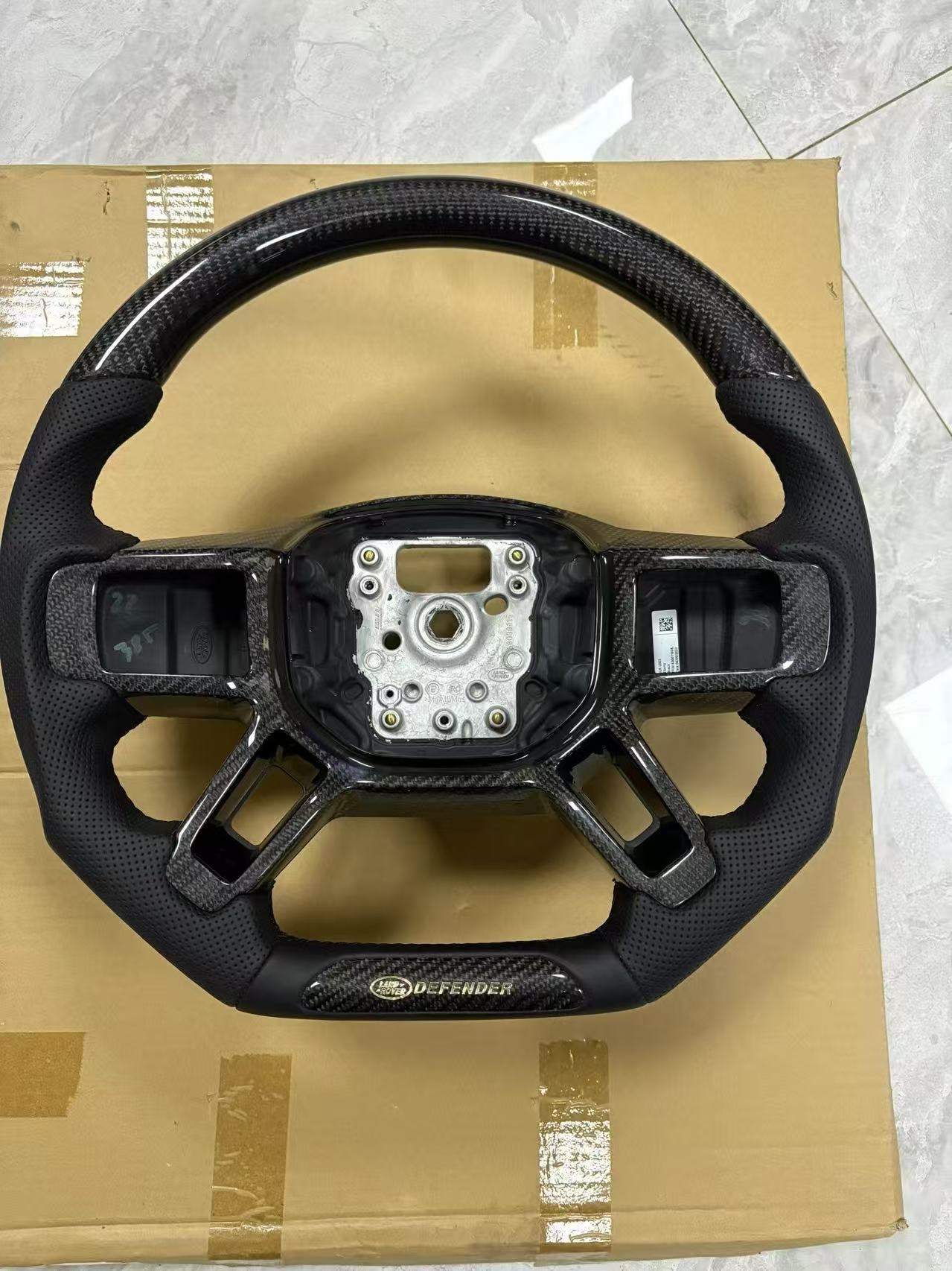 Defender L663 Carbon Fibre and Nappa Leather Steering Wheel